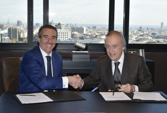 Firma convenio Caixabank